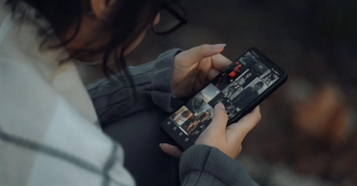 Woman viewing an Instagram profile on her phone